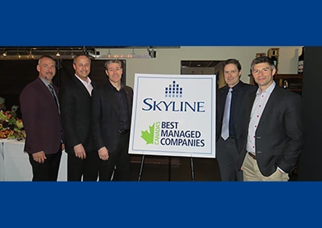 Skyline executives Wayne Byrd, Roy Jason Ashdown, Matthew Organ, Jason Castellan, and Martin Castellan were present to celebrate.