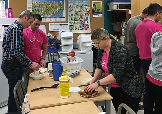 Skyline Management Team Serves Healthy Snacks to Hungry Kids