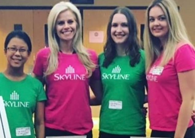 Four female Skyline employees attend the Power of Being A Girl event