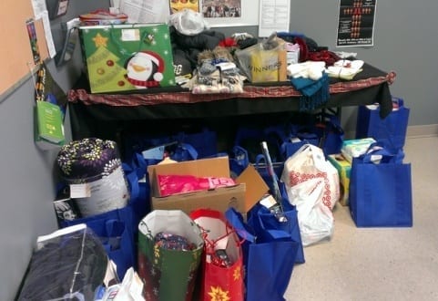 Skyline's Head Office is filled with bags of warm winter clothes, toys and games.