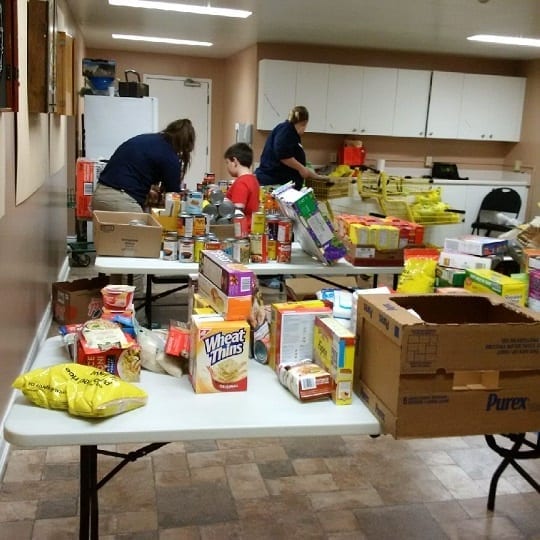 Tables full of food collected for the Food Drive