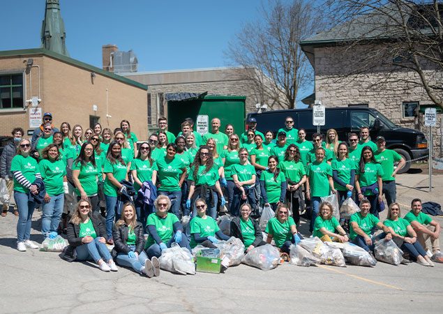 Skyline employees in bright green shirts celebrate Earth Day 2022